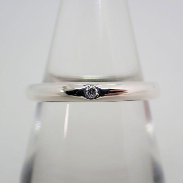 Elsa Peretti Wedding Band Ring with a diamond in silver